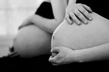 Mirrored pregnant woman