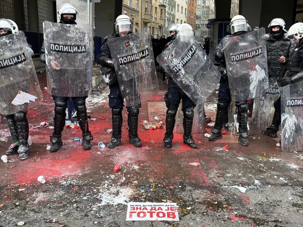 "He knows that we know that he knows that he's finished" police in red paint, Novi Sad, February 2025. cops